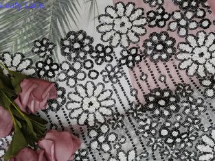 Vải thêu ren màu trắng đen tương phản bên