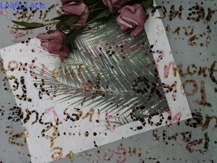 Vải tuyn màu in ren cho trang phục buổi tối