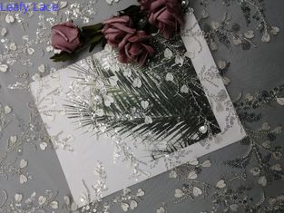 Vải thêu đính cườm ren màu trắng cho nữ
