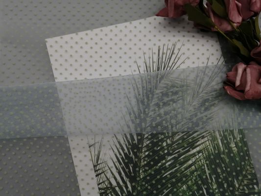 Vải tuyn màu xanh lá cây lấp lánh chấm bi