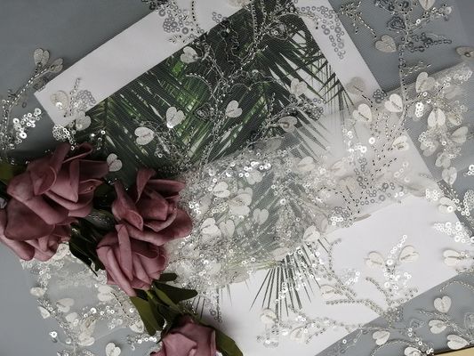 Vải thêu đính cườm ren màu trắng cho nữ