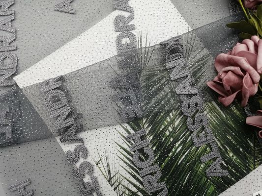 Vải lưới thêu lá kim tuyến màu xám cho trang phục dạ hội của quý cô