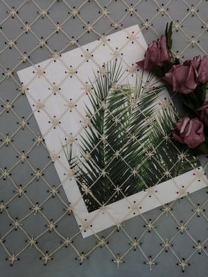 Vải thêu cườm hình học